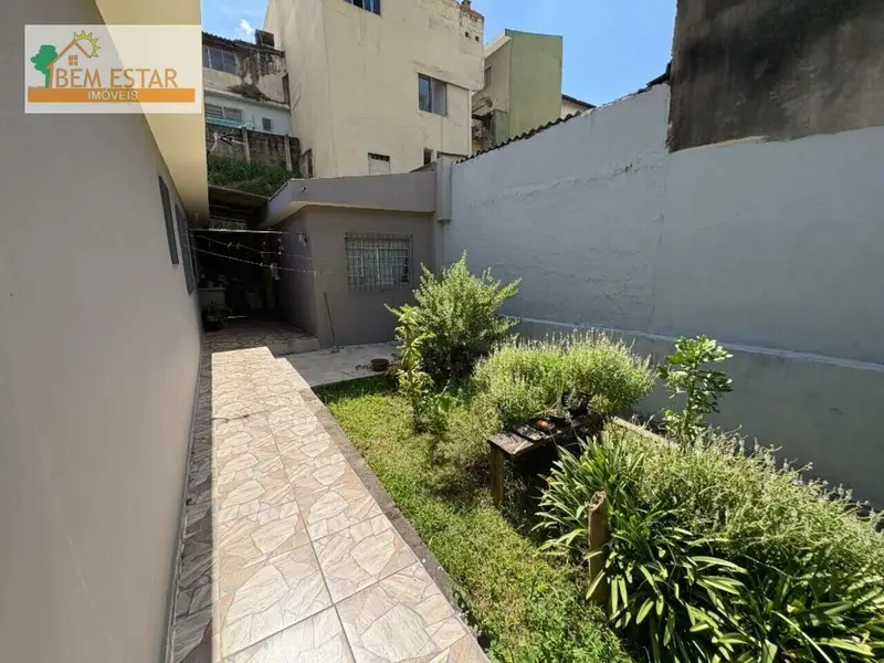 Casa com 3 quartos em Vila Tiradentes - foto 5